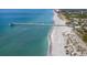 Aerial view of a pier and beach at 614 May Apple Way, Venice, FL 34293