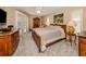 Large bedroom with plush carpeting, built-in wardrobe, and sliding glass doors at 614 May Apple Way, Venice, FL 34293