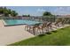 Enjoy the sun poolside at this resort-style community pool at 614 May Apple Way, Venice, FL 34293