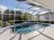 Inviting screened pool with ample deck space at 614 May Apple Way, Venice, FL 34293