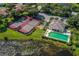 Enjoy a game on these well-maintained tennis courts at 614 May Apple Way, Venice, FL 34293