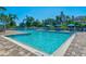 Inviting community pool with ample deck space and lounge chairs at 824 Blue Crane Dr, Venice, FL 34285