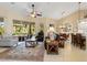 Relaxing living room with sliding doors to the pool area at 824 Blue Crane Dr, Venice, FL 34285