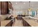 Modern kitchen with stainless steel appliances at 10788 Trophy Dr, Englewood, FL 34223