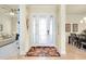 Bright and airy entryway with tile floors and stained glass door at 20314 Passagio Dr, Venice, FL 34293