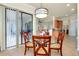 Kitchen with breakfast nook and view into the living area at 20314 Passagio Dr, Venice, FL 34293