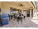 Outdoor patio with pool, table, and grill at 20314 Passagio Dr, Venice, FL 34293