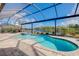 Inviting pool and spa with a screened lanai, perfect for outdoor entertaining at 20314 Passagio Dr, Venice, FL 34293