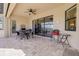 Outdoor patio with pool, table, and grill at 20314 Passagio Dr, Venice, FL 34293