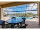 Covered patio overlooking the pool at 20314 Passagio Dr, Venice, FL 34293