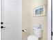 Small half bathroom with toilet and sink at 20314 Passagio Dr, Venice, FL 34293