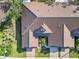 Top-down view of villa with tile roof and courtyard at 2232 Lynx Run, North Port, FL 34286