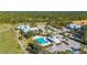 Community clubhouse and pool with ample parking at 2232 Lynx Run, North Port, FL 34286