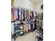 Large walk-in closet with ample hanging space and shelving at 2232 Lynx Run, North Port, FL 34286