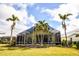 Home with screened pool and tropical landscaping at 340 Bermuda Ct # 5, Venice, FL 34293