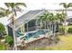 Aerial view of a home with a screened-in pool and patio at 340 Bermuda Ct # 5, Venice, FL 34293