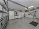 Garage with ample storage and workshop area at 444 Pinewood Lake Dr, Venice, FL 34285