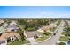 Aerial view of homes and a residential street in a Florida community at 5003 Southern Pine Cir, Venice, FL 34293