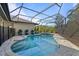 Inviting screened pool with paved deck at 5003 Southern Pine Cir, Venice, FL 34293