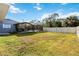 Spacious backyard with pool, patio, and fenced enclosure at 5172 Rolla Rd, Venice, FL 34293