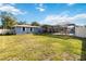 Large backyard with a shed and screened-in pool area at 5172 Rolla Rd, Venice, FL 34293