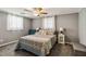 Bright bedroom featuring a queen-size bed and ample closet space at 5172 Rolla Rd, Venice, FL 34293