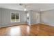 Bright living room with hardwood floors and entryway at 5296 Rolla Rd, Venice, FL 34293