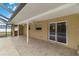 Spacious covered patio adjacent to the pool at 5296 Rolla Rd, Venice, FL 34293