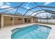 Inviting pool area with screened enclosure and patio at 5296 Rolla Rd, Venice, FL 34293