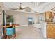 Kitchen and dining area with breakfast bar and tile floor at 5298 Drew Rd, Venice, FL 34293