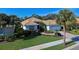 Single-story house with tile roof and palm trees at 589 Pond Willow Ln, Venice, FL 34292