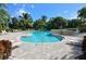 Resort-style pool with plenty of lounge chairs at 589 Pond Willow Ln, Venice, FL 34292