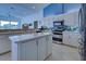 Modern kitchen with stainless steel appliances and island at 746 Fringed Orchid Trl, Venice, FL 34293