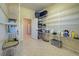 Well-organized pantry offering extensive shelving for storage needs at 746 Fringed Orchid Trl, Venice, FL 34293