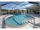 Inviting screened pool with a fountain and convenient access from the house at 746 Fringed Orchid Trl, Venice, FL 34293