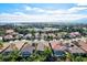 Aerial view of houses in a residential neighborhood near the coast at 121 Amora Ave, Venice, FL 34285