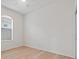 Light and bright bedroom with wood-look floors at 121 Amora Ave, Venice, FL 34285