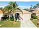 Single-Gathering home with a two-car garage and attractive landscaping at 121 Amora Ave, Venice, FL 34285