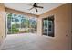 Screened lanai with view of backyard at 121 Amora Ave, Venice, FL 34285