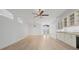 Light and airy living room with hardwood floors at 121 Amora Ave, Venice, FL 34285