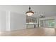 Living area with built-in cabinets and sliding doors to patio at 121 Amora Ave, Venice, FL 34285