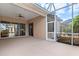 Extended screened patio with access to backyard at 121 Amora Ave, Venice, FL 34285
