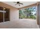 Spacious screened porch with sliding glass doors at 121 Amora Ave, Venice, FL 34285