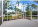 View from inside the screened porch of the backyard at 121 Amora Ave, Venice, FL 34285