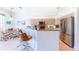 Kitchen features stainless steel appliances and a breakfast bar at 125 Amora Ave, Venice, FL 34285