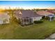 Aerial view of home and surrounding neighborhood at 1307 Highland Greens Dr, Venice, FL 34285