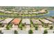 Aerial view of community with lake at 13510 Esposito St, Venice, FL 34293