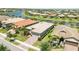Aerial view of homes and lake at 13510 Esposito St, Venice, FL 34293
