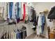 Walk-in closet with ample hanging and shelving space at 13510 Esposito St, Venice, FL 34293