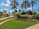 Islandwalk community entrance with lush landscaping and fountain at 13510 Esposito St, Venice, FL 34293